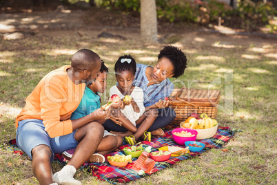 Happy family eating together