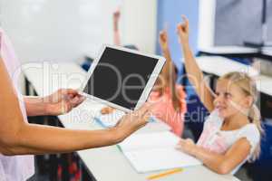 Close up view of tablet pc holding by a teacher