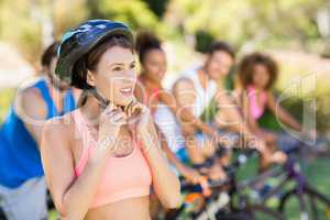 Beautiful woman wearing bicycle helmet