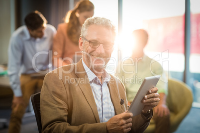 Businessman holding digital tablet