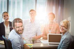 Business people sitting at desk