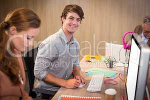 Young businessman sitting in office