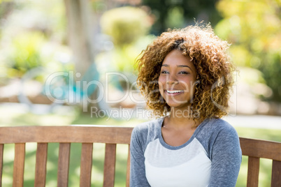 Portrait of woman sitting on the bench