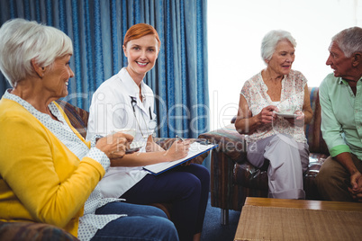 Smiling nurse looking at camera