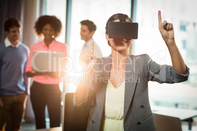 Businesswoman wearing virtual glasses