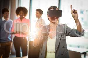 Businesswoman wearing virtual glasses