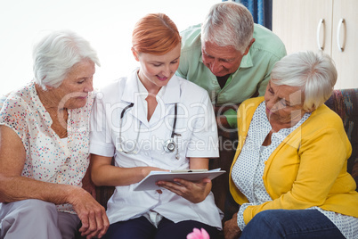 Retired person looking at a notebook