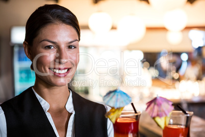 Waitress holding cocktails