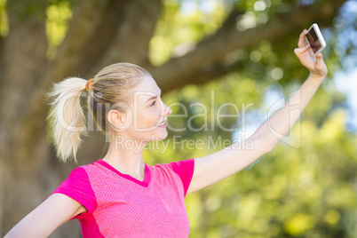 Woman taking selfie with the mobile phone