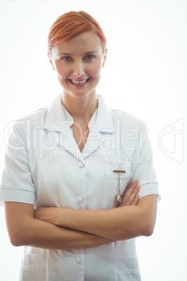 Portrait of a smiling nurse crossing arms