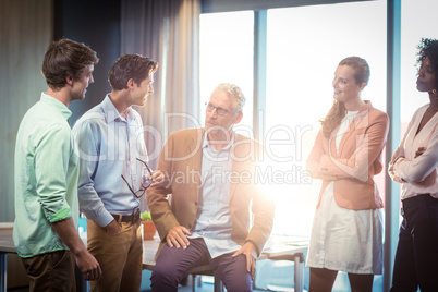 Business people having discussion with each other