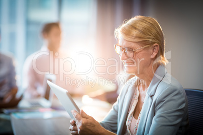 Businesswoman using digital tablet