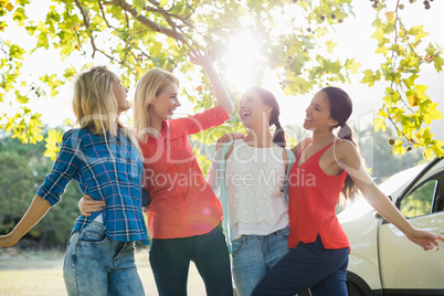 Group of friends having fun in park