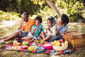 Happy family eating together