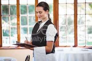 Waitress using a tablet