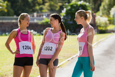 Female athletes interacting with each other