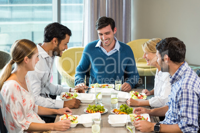 Business people having breakfast