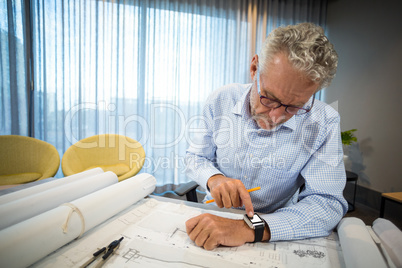 Man adjusting time on his watch