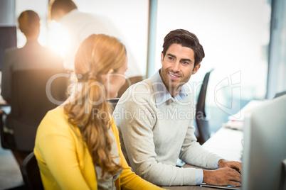 Woman having a discussion with coworker