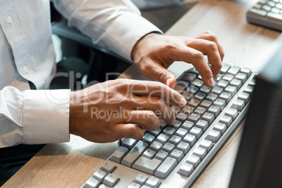 Man using computer keyboard