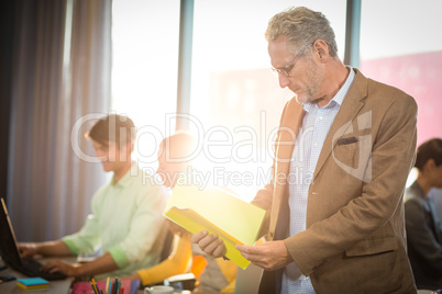 Businessman looking at document