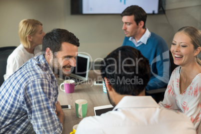 Business people interacting during a meeting