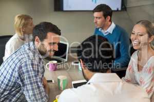 Business people interacting during a meeting