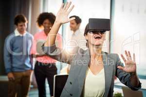 Businesswoman wearing virtual glasses