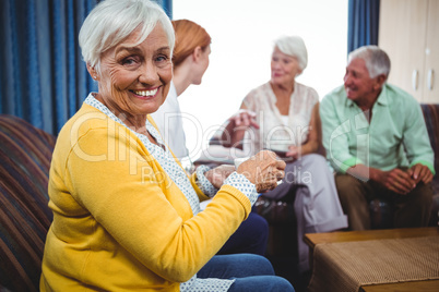 Senior persons and a nurse