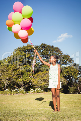 Daughter holding balloon