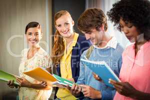 Business people holding files