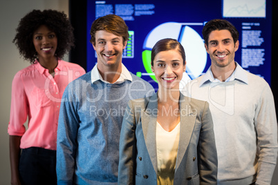 Portrait of business people standing in the conference room