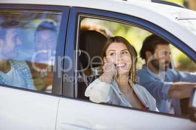 Beautiful woman looking out from car window