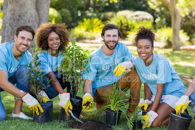 Portrait of volunteer group planting