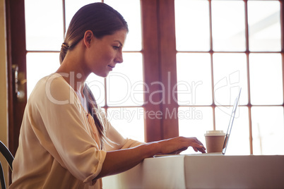 Woman using a laptop