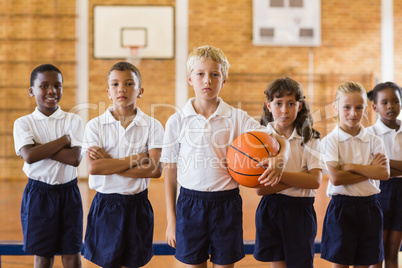 Students posing with arms crossed