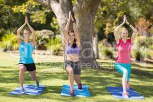 Young women doing yoga
