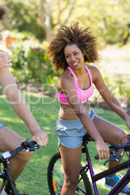 Woman smiling while cycling