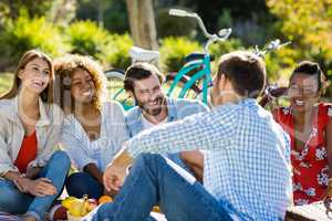 Friends having fun in park