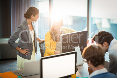 Business people working on computer