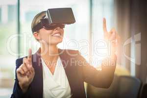 Businesswoman using the virtual reality headset