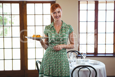 Woman holding a plate