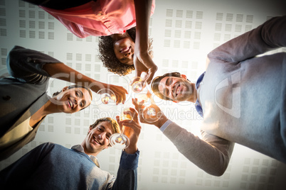 Portrait of business people toasting wine glasses