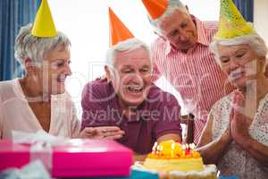 Senior persons celebrating birthday