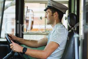 Bus driver driving a bus