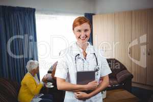 Portrait of a smiling nurse with senior