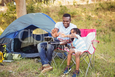 Happy family lying on a chair together