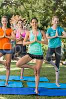 Women practicing yoga