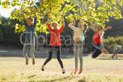 Group of friends having fun in park