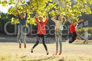 Group of friends having fun in park